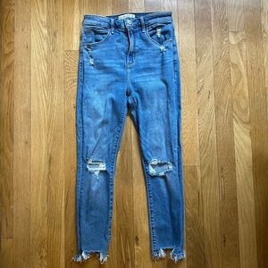 Distressed Blue Jeans